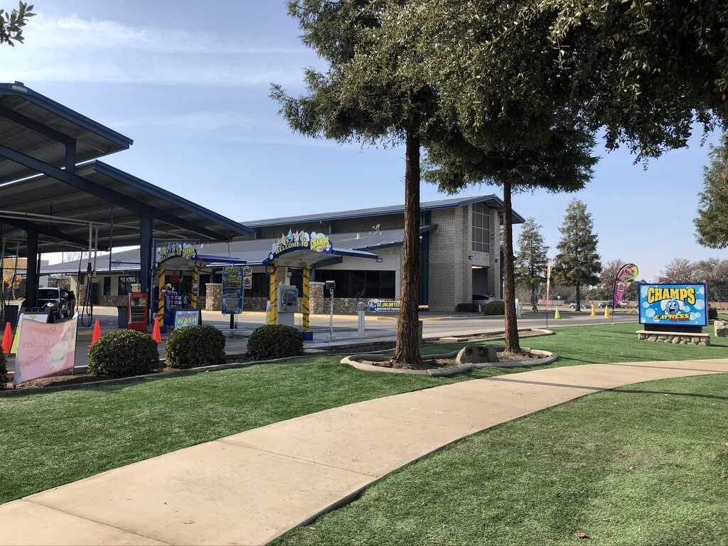 Champs Express Car Wash on W. Caldwell Ave in Visalia, with pay stations and vacuum canopy